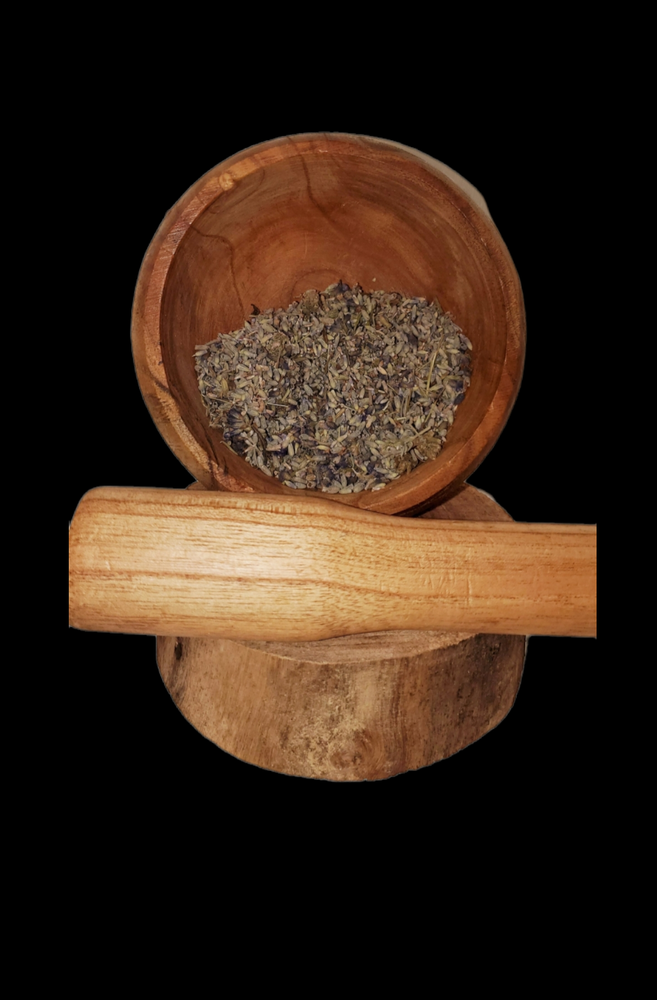 Wooden mortar filled with herbal tea.